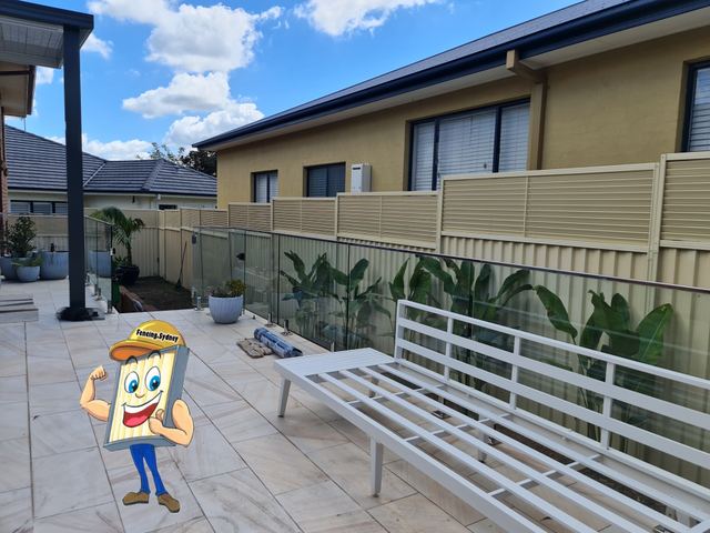 Existing Colorbond fence extended with a 600 mm louvre height extension