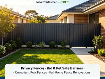 Charcoal Colorbond privacy fence running across a newly turfed front yard