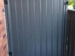 Close view of a charcoal Colorbond pedestrian gate