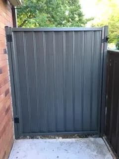 Close view of a charcoal Colorbond pedestrian gate