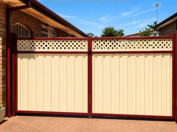 The scene shows a mid grey corrugated steel fence where a gate sits in the run, lattice tops the panels, sleepers form the base.
