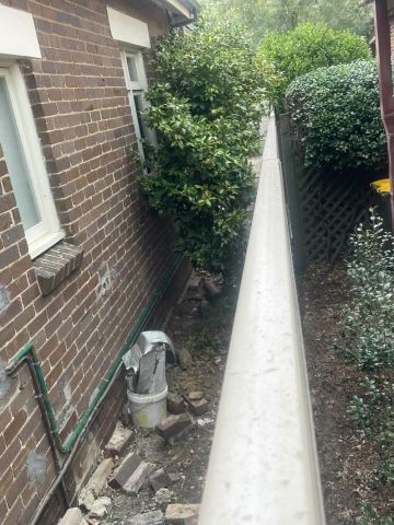 Installed Colorbond sheets forming a privacy boundary.