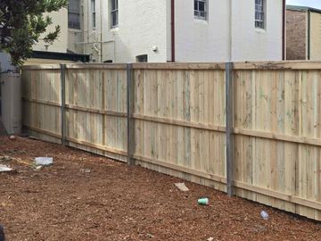 New treated pine palings on a residential block.