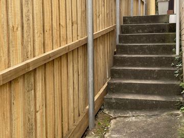 New treated pine palings on a residential block.