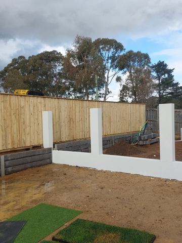 New treated pine palings on a residential block.