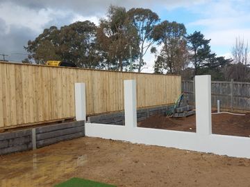 New treated pine palings on a residential block.