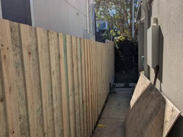 New treated pine palings on a residential block.